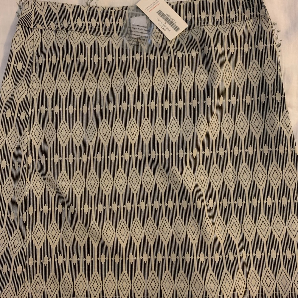 RipSkirt Hawaii length 2, size small WestEnd black and tan NWT